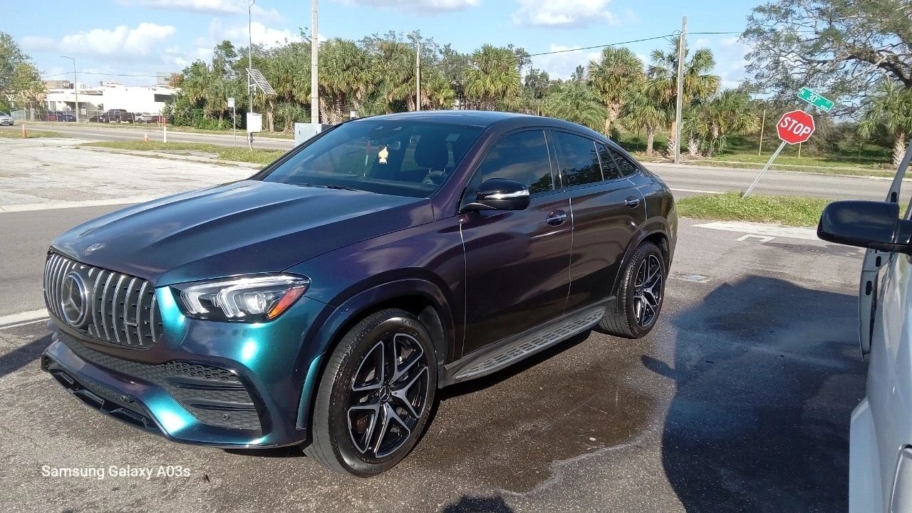 Black Mercedes truck after a full exterior detail and gloss finish