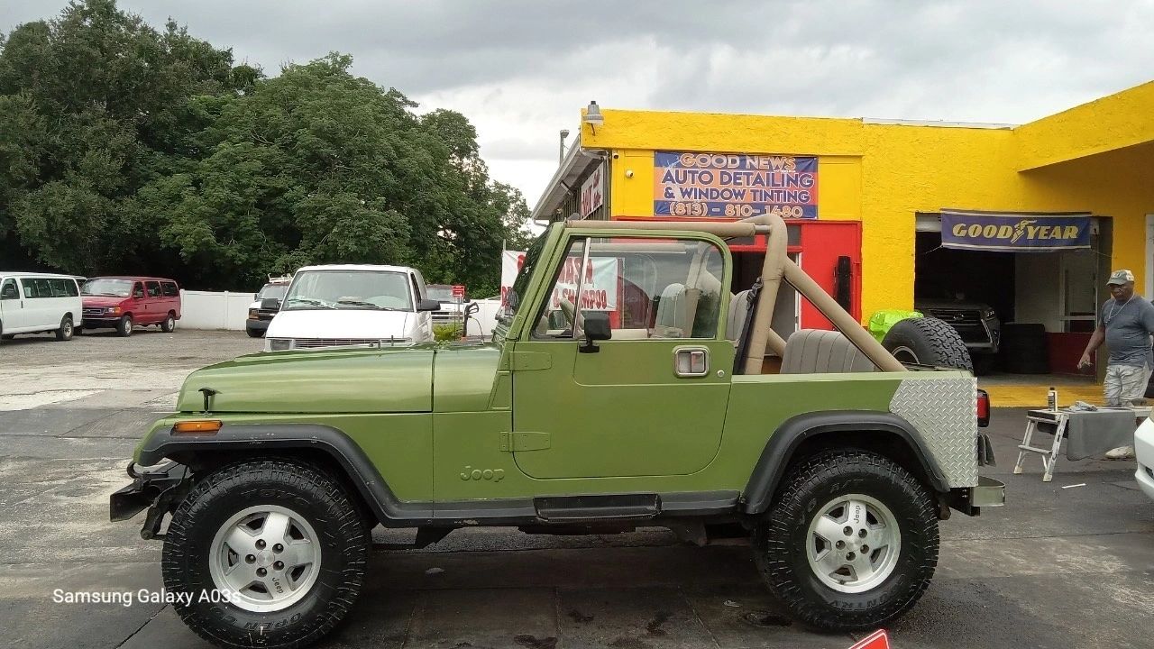 Green Jeep detailed inside and out at our Tampa shop