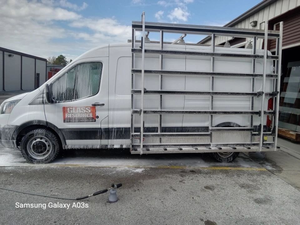White truck with freshly installed window tint on the side glass